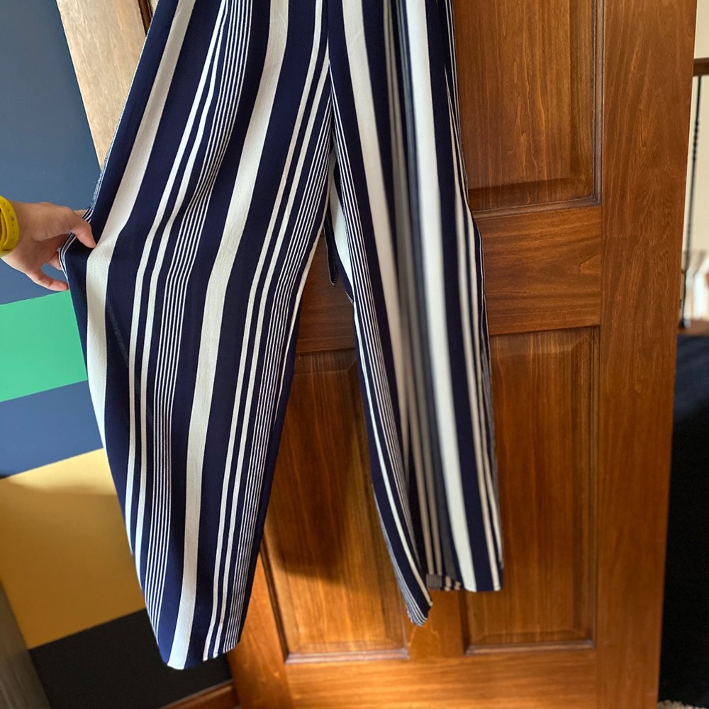Navy blue and white jumpsuit with side slit